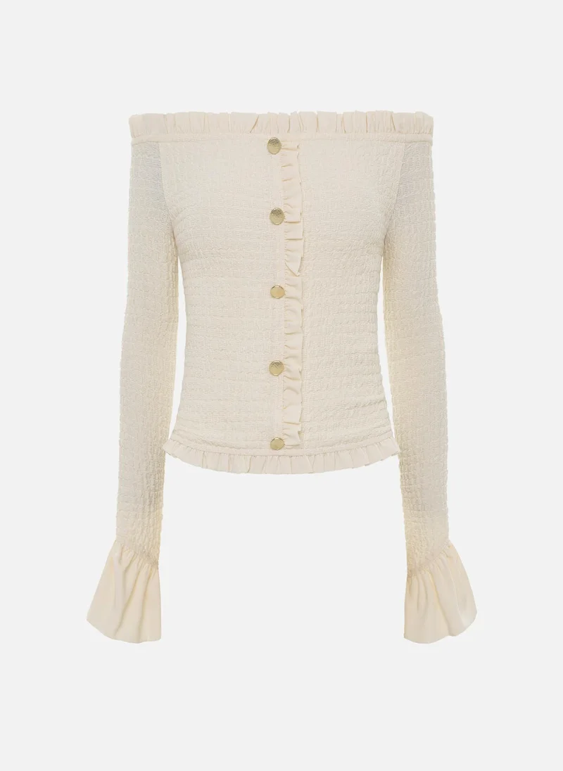 ليتشي بلوزة مكشوفة الكتفين من قماش منقوش